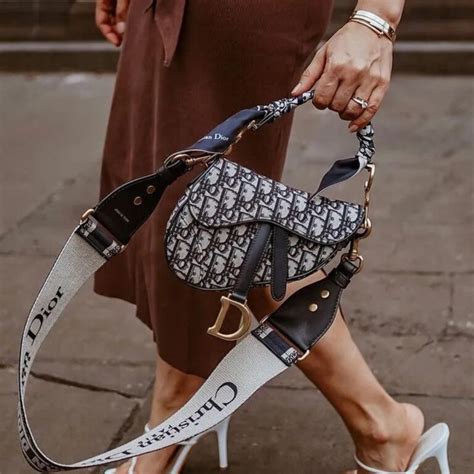 history of dior saddle bag